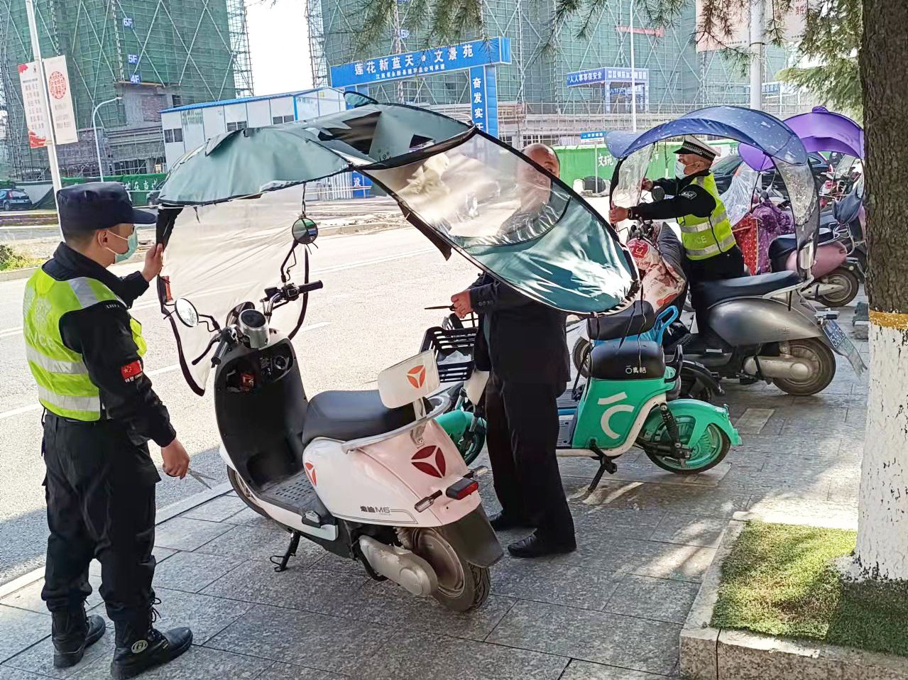 工艺刺绣与摩托车晴雨伞整治