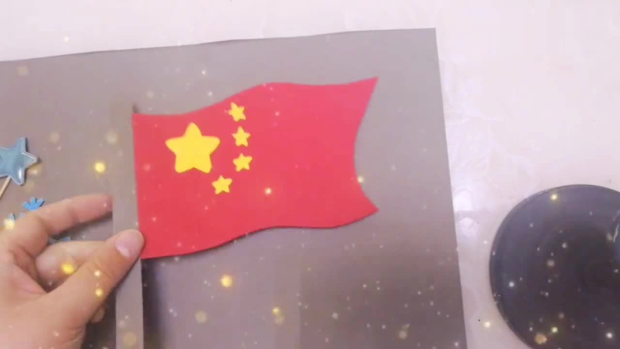 红旗与卡纸制作民族服饰视频